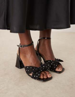 Exclusive mid heel sandals with embellished bow in black