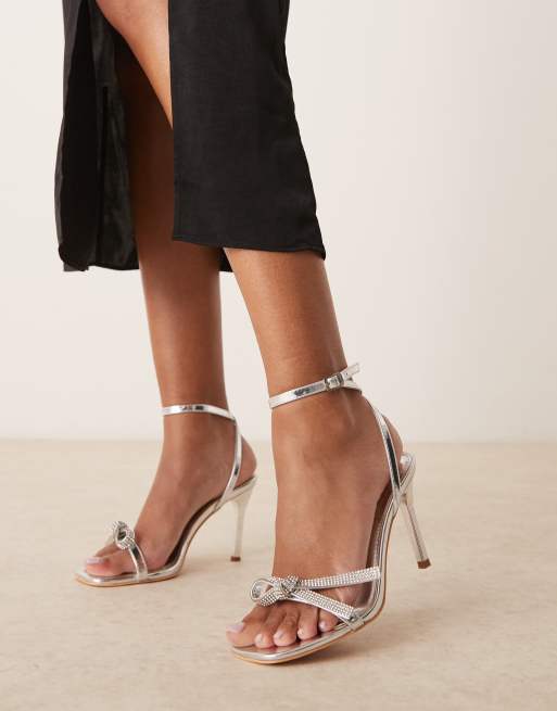 Glamorous Wide Fit stiletto heeled sandals with embellished bow in silver