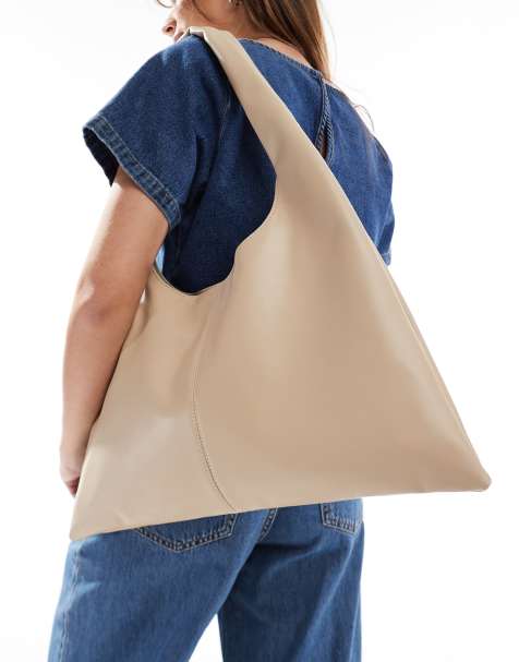 Glamorous winged shoulder tote bag in cream - view 1