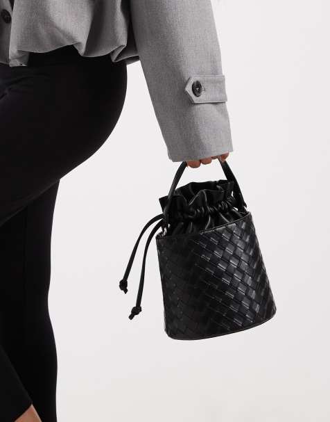 Glamorous woven bucket bag in black - view 1