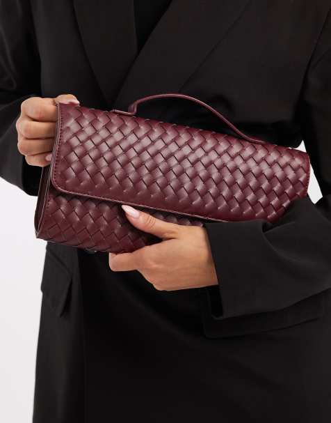Glamorous woven clutch bag in burgundy - view 1