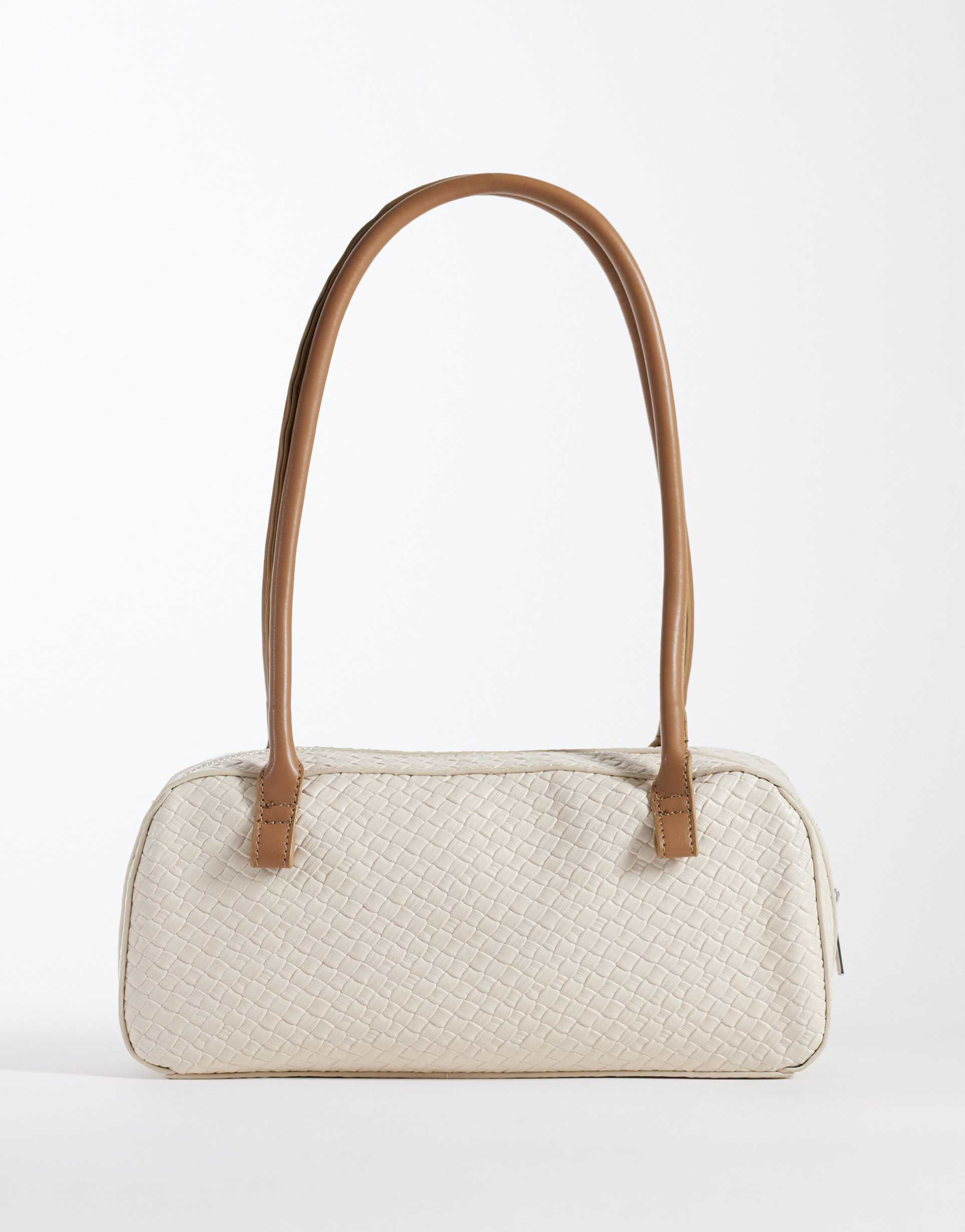 glamorous woven raffia elongated shoulder bag with faux leather details in cream