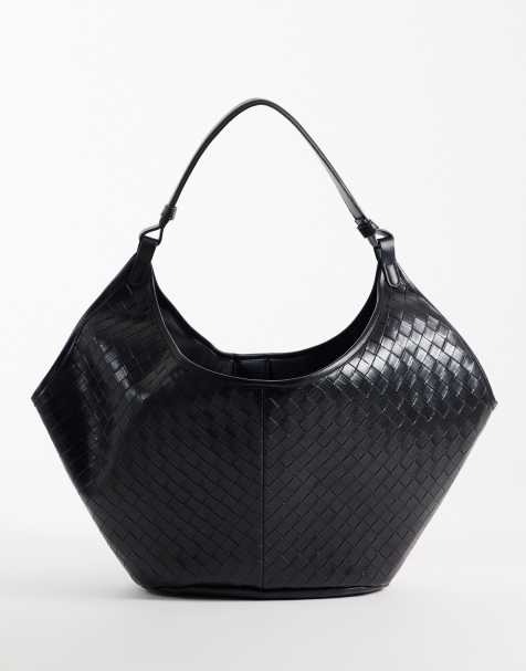 Glamorous woven shoulder tote bag in black weave - view 1
