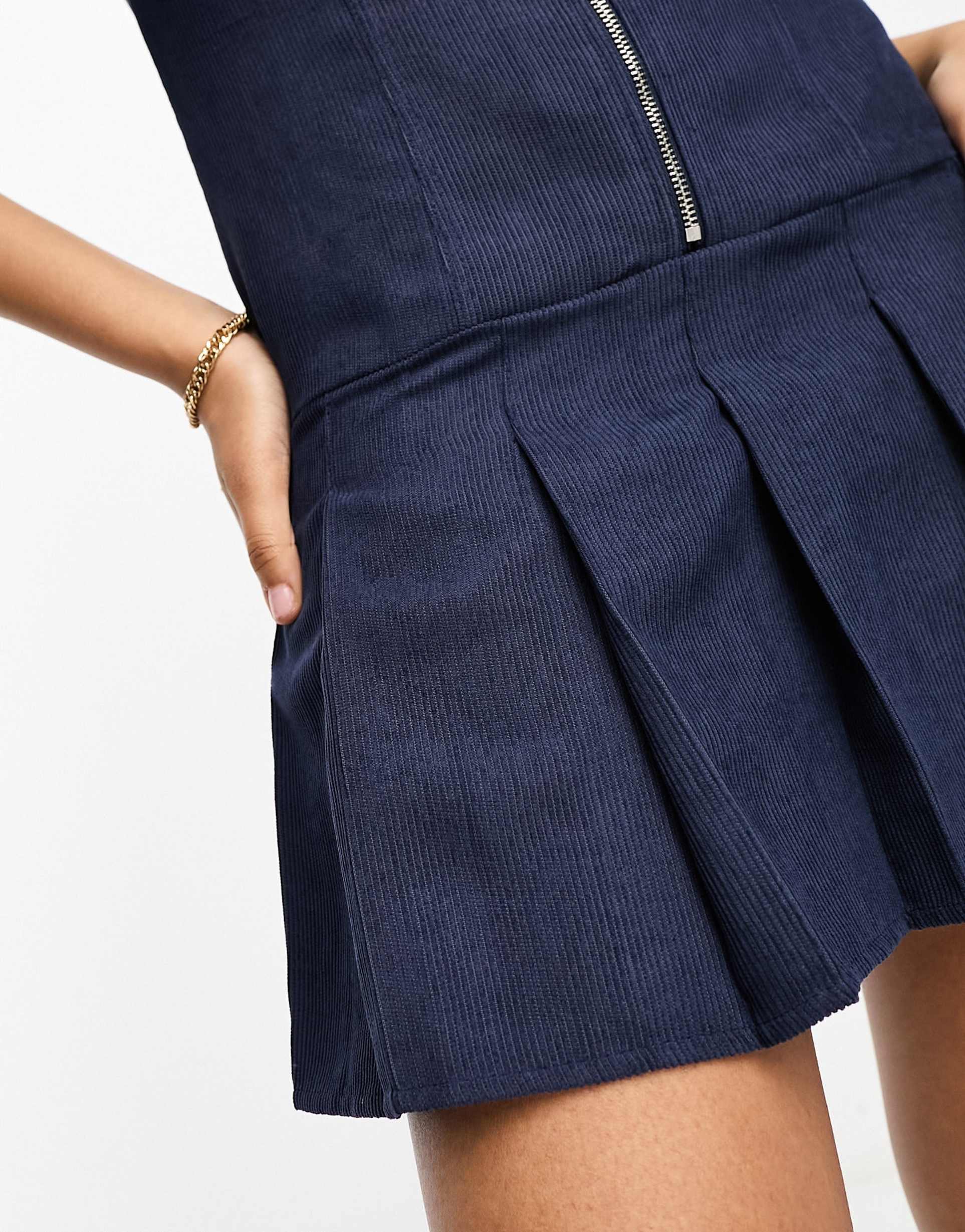 glamorous zip through peplum pleat navy cord mini dress