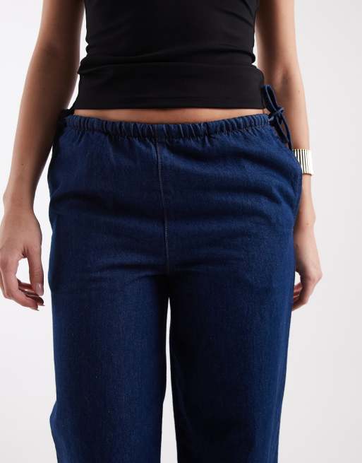Globo azul añil de corte slim, talle bajo y pernera globo de ASOS DESIGN, 4 de 5