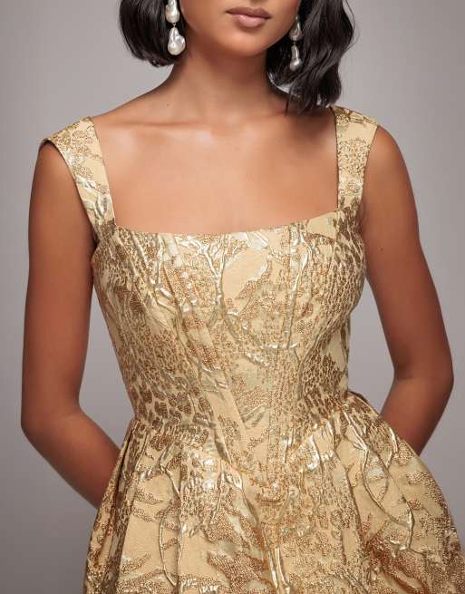 Goddiva Corset balloon skirt lace up back mini dress in gold | ASOS