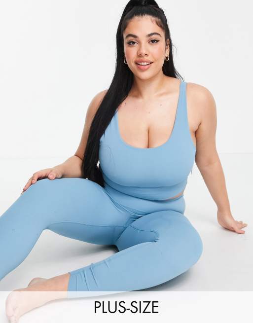 Голубая укороченная майка Nike Yoga Plus Luxe | ASOS