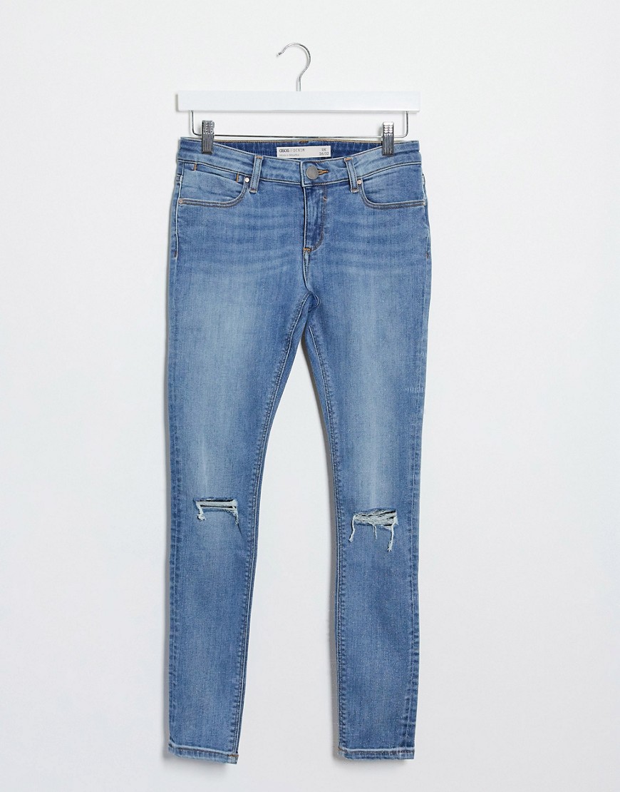Голубые рваные джинсы скинни с заниженной талией ASOS DESIGN-Голубой