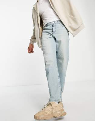 Светлые джинсы Голубые свободные джинсы с эффектом тонирования ASOS DESIGN-Голубой