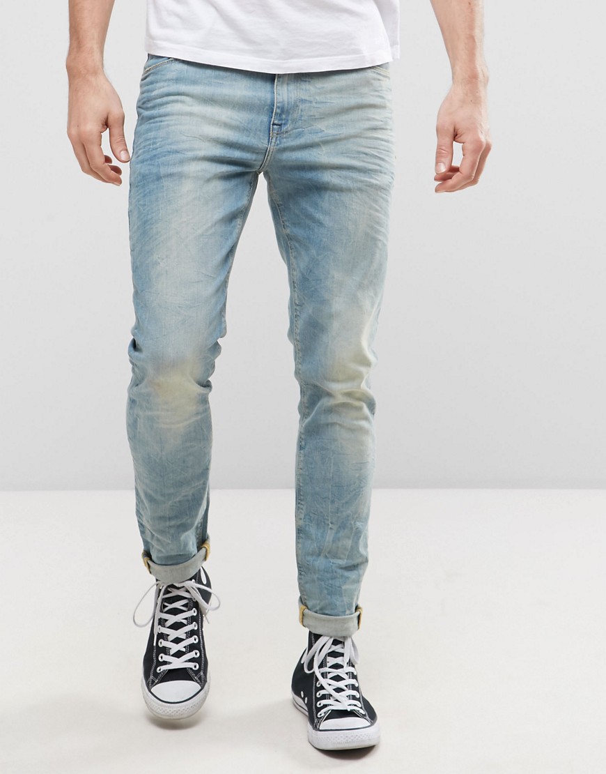 фото Голубые выбеленные джинсы скинни из денима плотностью 12,5 унц asos design-синий