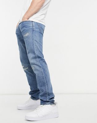 фото Голубые выбеленные узкие джинсы с рваной отделкой polo ralph lauren sullivan-голубой
