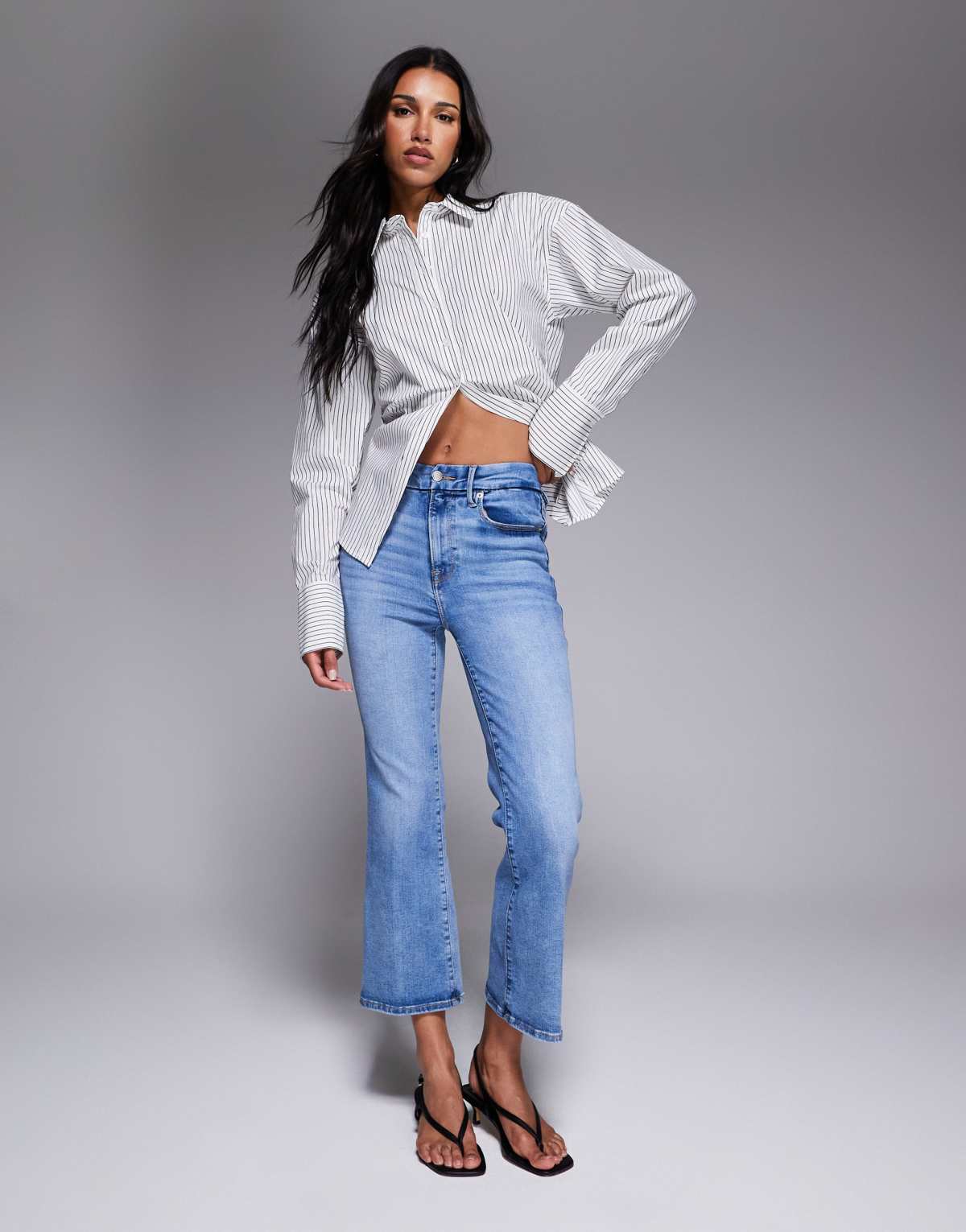 Good American always fits good legs cropped mini boot jeans in mid blue