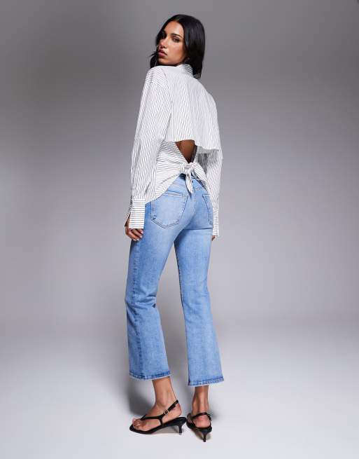 Good American always fits good legs cropped mini boot jeans in mid blue , 2 of 5