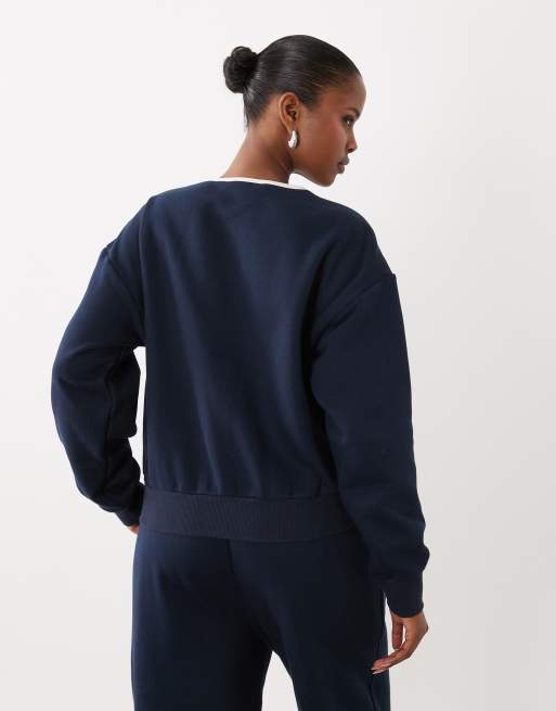 Good American brushed fleece long sleeve henley top co-ord in navy, 4 of 4