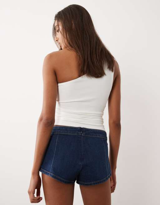 Good American denim low waist micro shorts in dark blue wash, 5 of 5