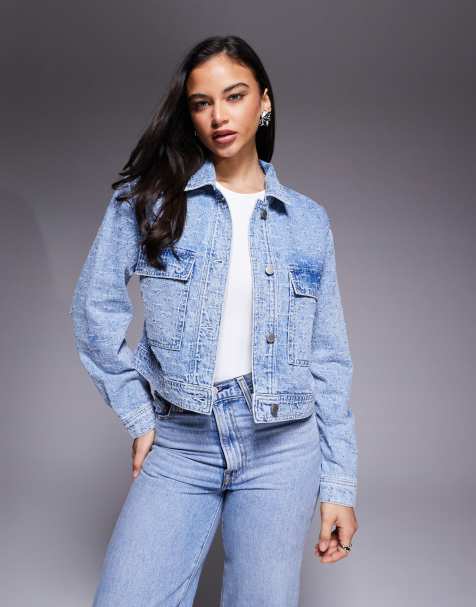 Good American distressed rhinestone denim jacket in light blue wash