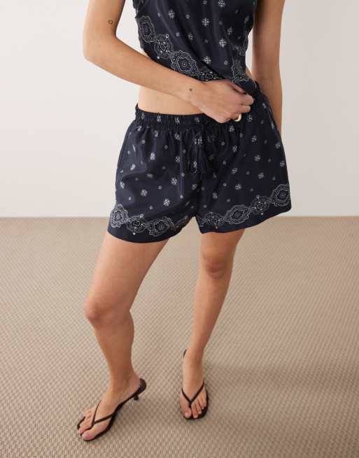 Good American drawstring waist boxy short co-ord in navy bandana print, 2 of 5