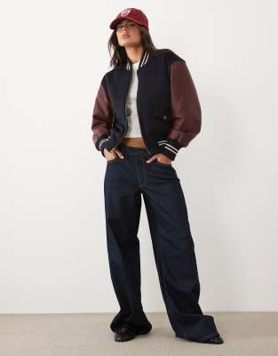 Good American Faux Leather Varsity Jacket In Blue