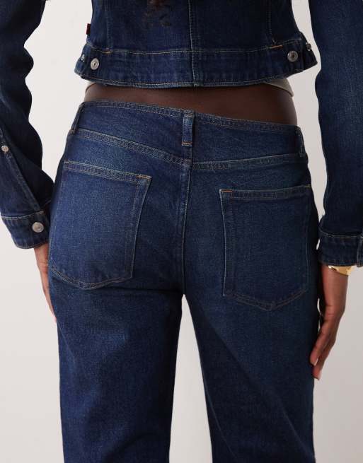 Good American ghost waist low rise bootcut jean in indigo, 4 of 5