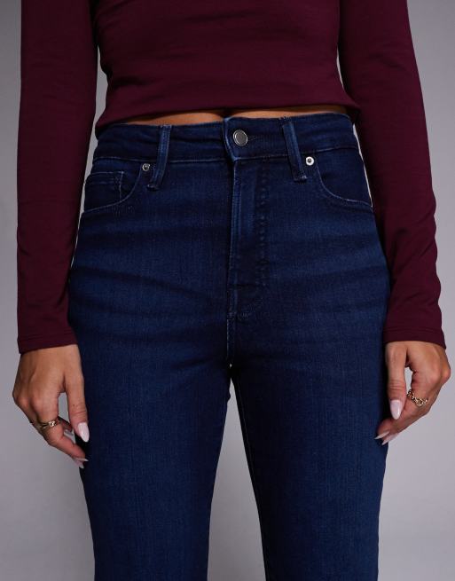 Good American good classic bootcut jeans in dark blue wash, 4 of 5
