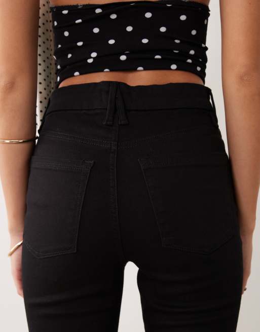 Good American Good Classic high waisted bootcut power stretch denim jeans in black, 4 of 5
