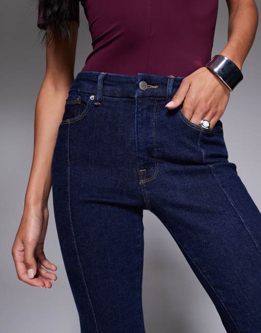 Good American Good Legs flare jeans in dark blue, 5 of 5