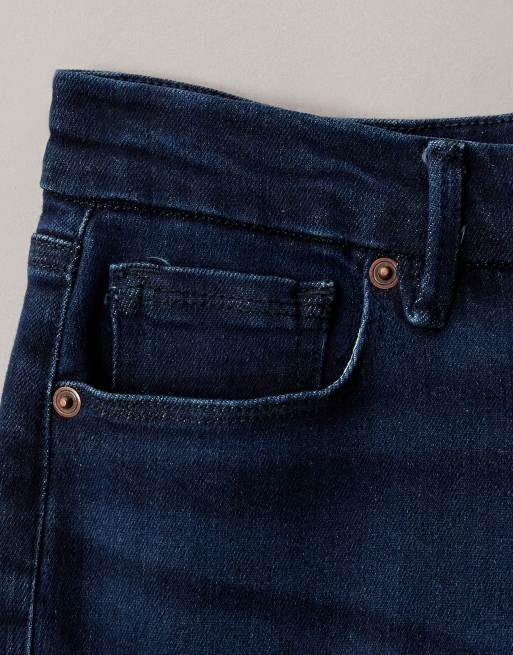 Good American - Good Legs - Flared compressiejeans in donkerblauwe wassing, 6 van 7
