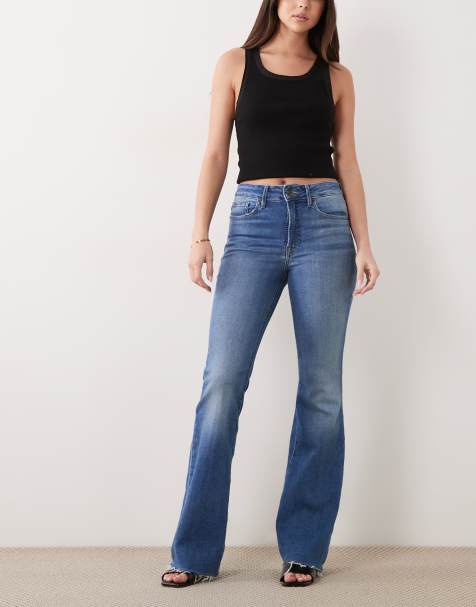 Good American – Good Legs – Mellanblå, tvättade, utsvängda jeans - view 1