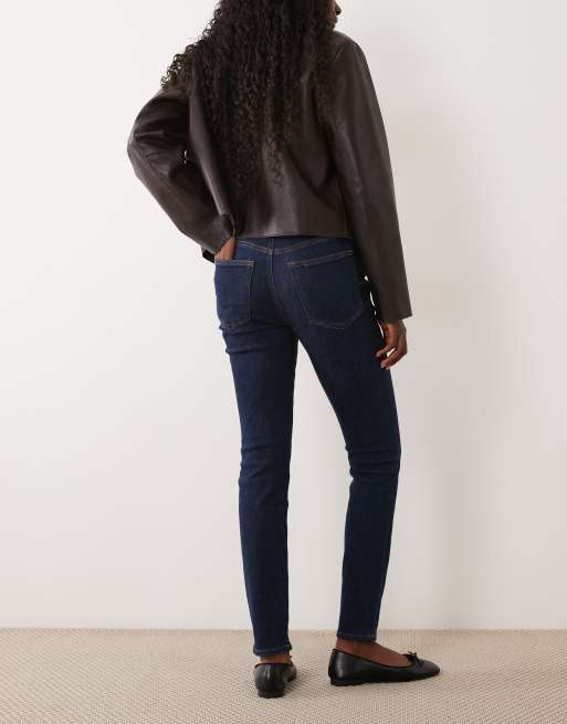 Good American good legs mid rise skinny jeans in dark blue wash, 3 of 5