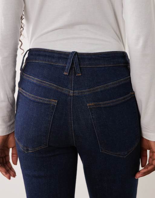 Good American good legs mid rise skinny jeans in dark blue wash, 5 of 5