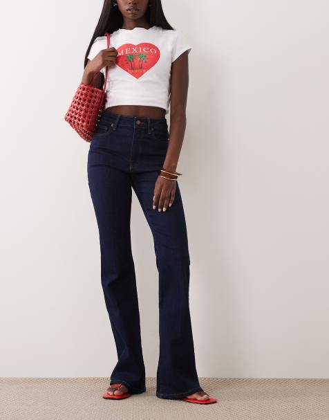 Good American – Good Legs – Mörkblå, tvättade och utsvängda jeans - view 1