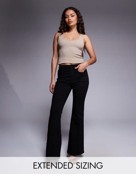 Good American good petite flare jeans in black - view 1