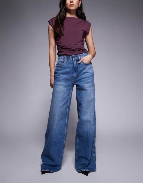 Good American Good Skate high waisted wide leg comfort denim jeans in mid blue wash