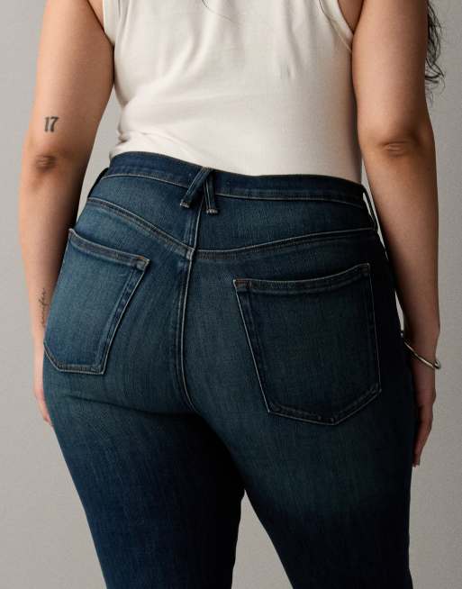 Good American good standard kick flare jeans in dark blue wash, 4 of 7