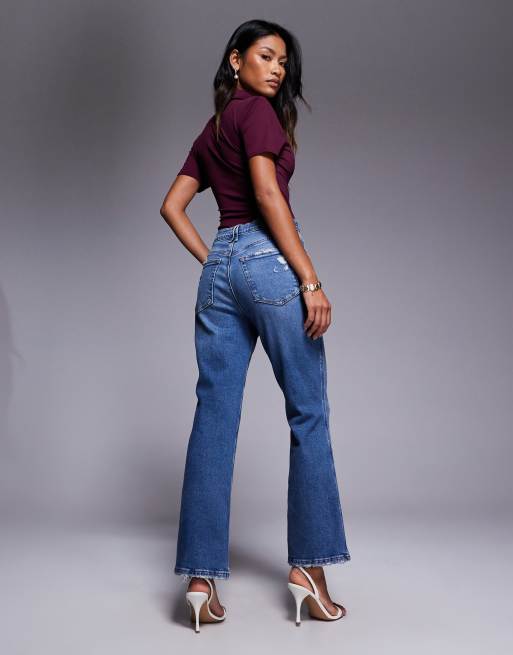 Good American Good Standard kick flare jeans in dark blue, 3 of 4