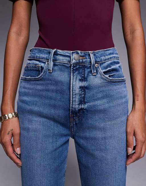 Good American Good Standard kick flare jeans in dark blue, 4 of 4