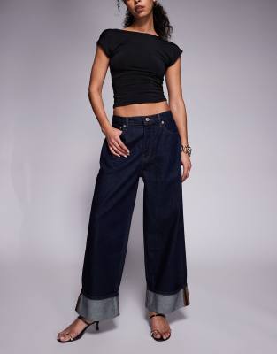 Good American - Good Standard - Weite Jeans in schwarzer und dunkelblauer Waschung mit Umschlag