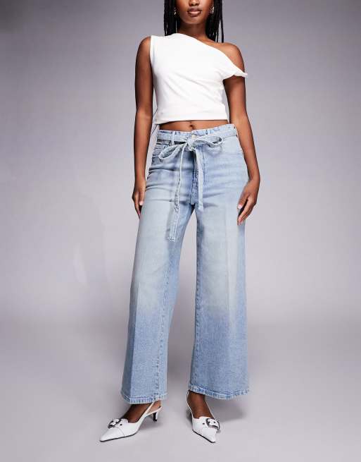 Good American – Good Waist – Jasnoniebieskie krótsze jeansy palazzo