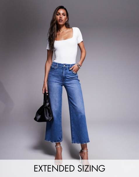 Good American good waist palazzo crop jeans in dark blue - view 1
