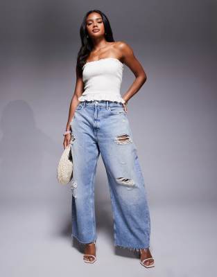Good American – Jasnoniebieskie jeansy extreme barrel - view 1