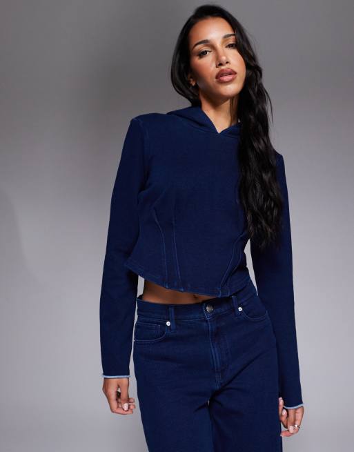 Good American - Jeanius - Felpa con cappuccio stile corsetto blu navy in coordinato
