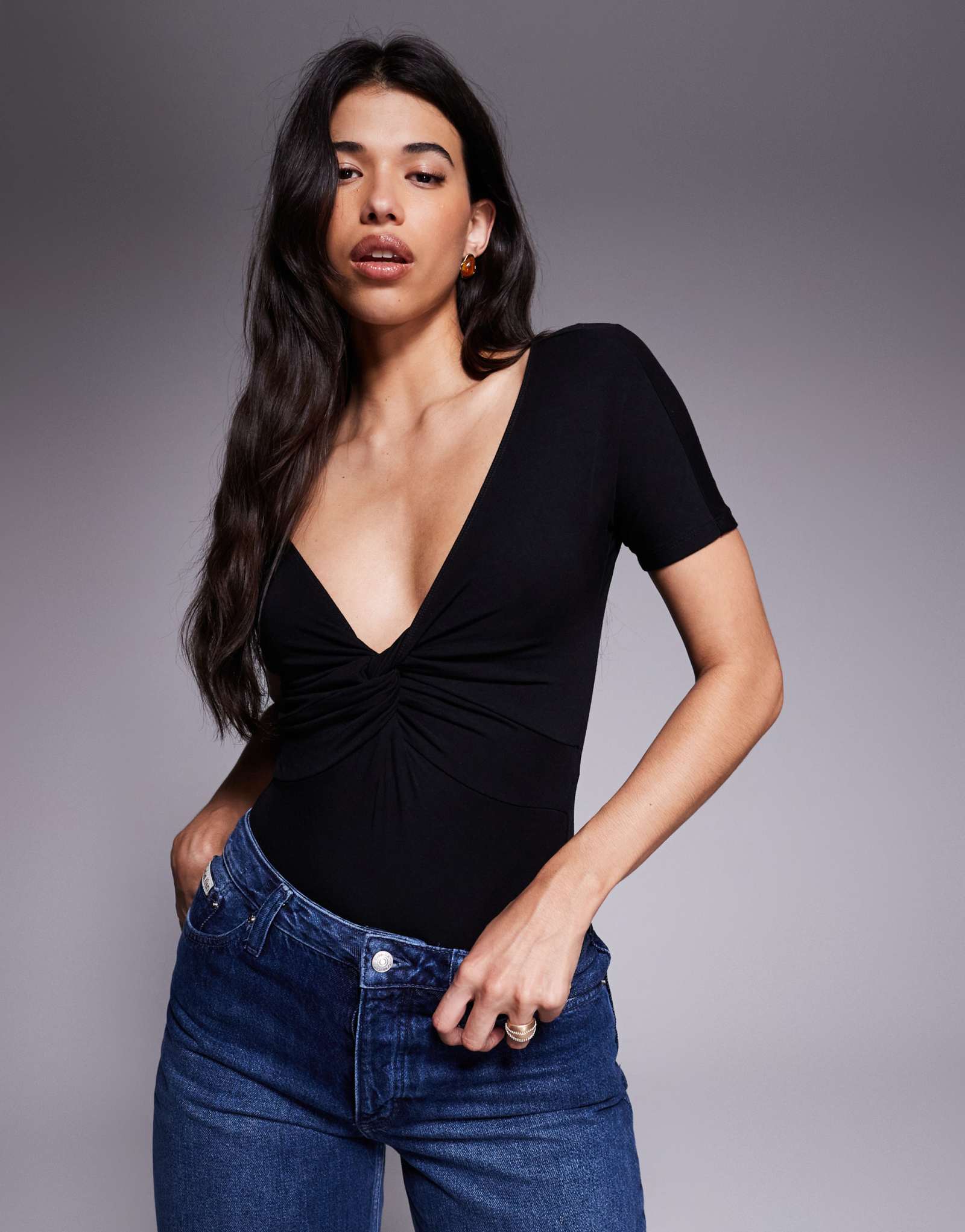 Боди из хорошего американского трикотажа с закручивающейся передней частью черного цвета