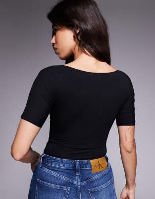 Good American Jersey Twist Front Bodysuit In Black