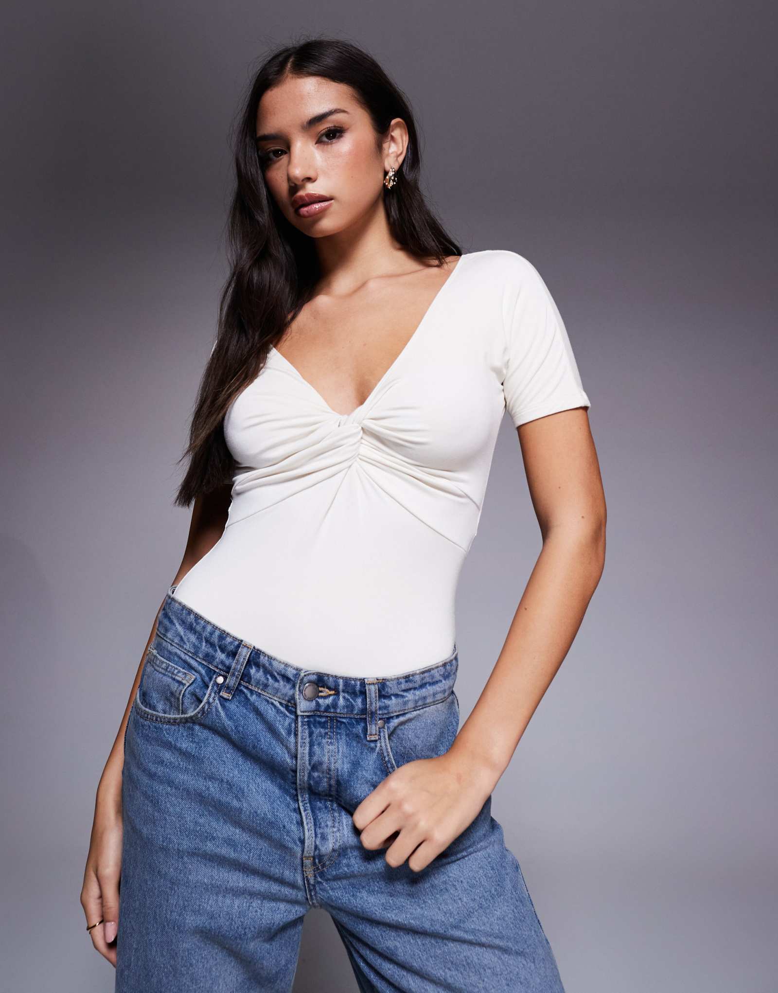 Боди из хорошего американского трикотажа с закручивающейся передней частью белого цвета