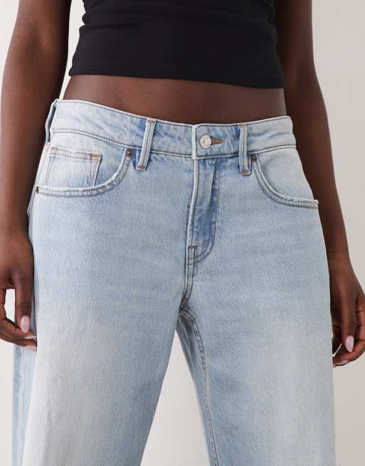Good American - Lavtaljede og baggy lyseblå jeans med flænger, 5 af 5