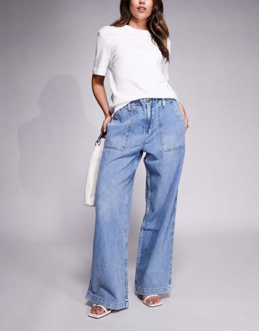 Good American lite denim pants in mid blue