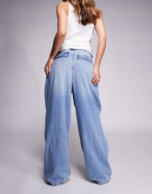 Good American lite linen look denim parachute pants in mid