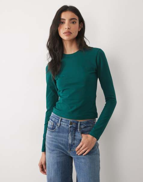Good American long sleeve baby tee in forest green - view 1
