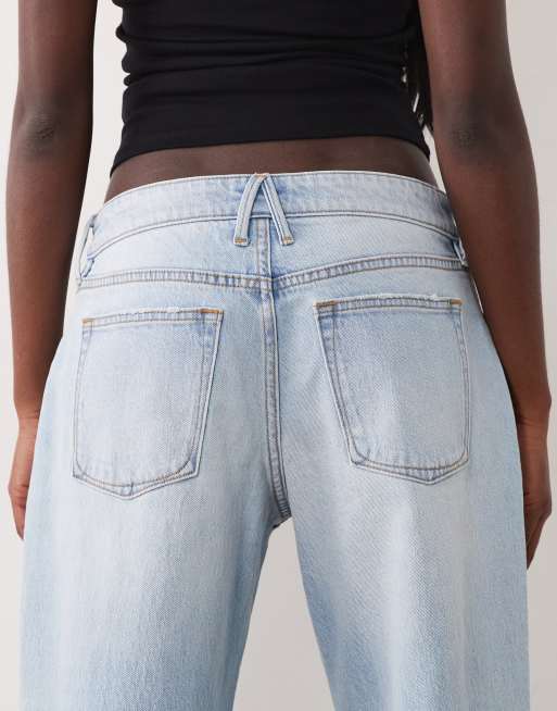 Good American low waist baggy fit rip jeans in light blue wash, 4 of 5