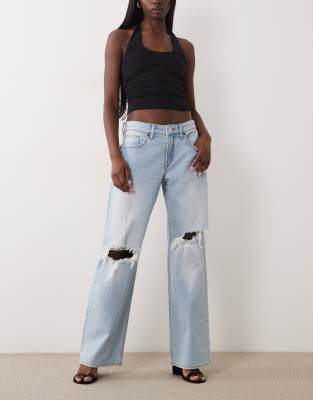 Good American Low Waist Loose Fit Knee Rip Jeans In Blue